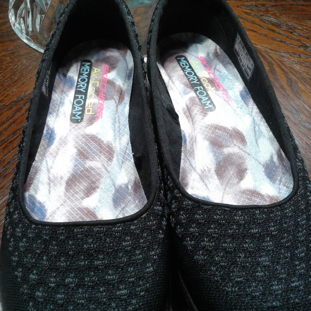 Skechers slip on flats.